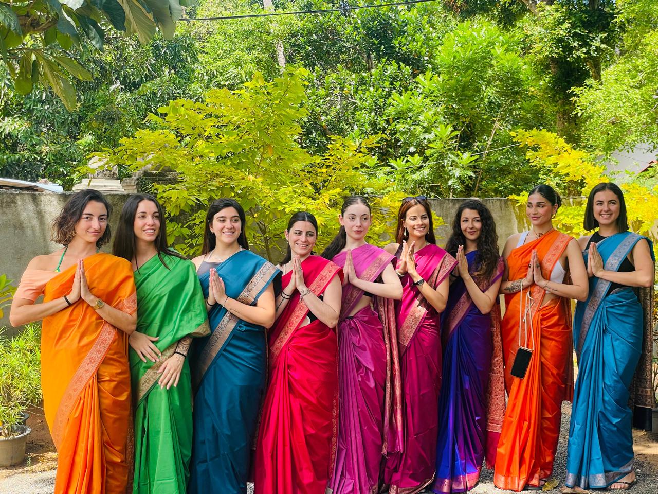 International travellers enjoying a Sri Lankan cultural experience